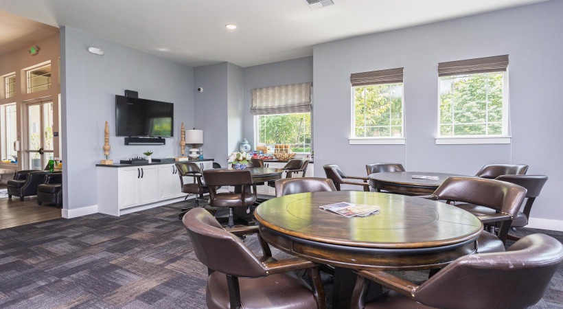 a dining lounge with a tv
